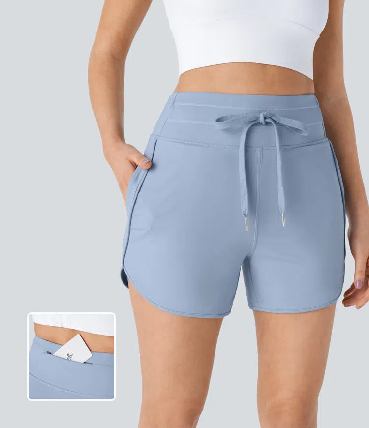 High Waisted Drawstring Multiple Pockets Curved Hem Yoga Shorts - PURE-YOGA